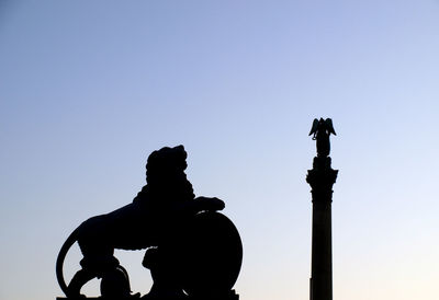 Low angle view of statue against clear sky