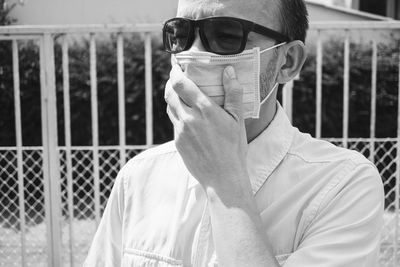 Men wearing surgical masks to prevent respiratory diseases, portrait of a man scared of covid-19.