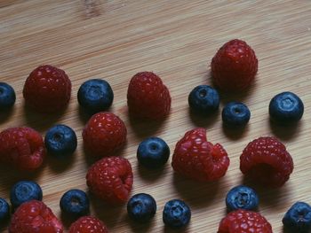 High angle view of strawberries on table