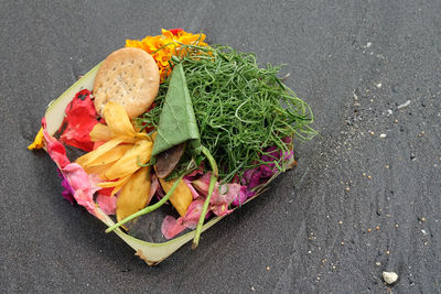 High angle view of multi colored roses on road