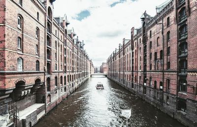 View of buildings in city against sky