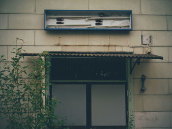 Low angle view of window of old building