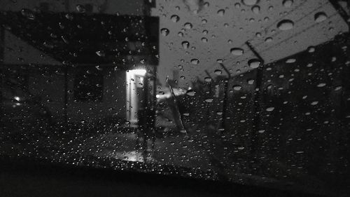 Close-up of wet window in rainy season