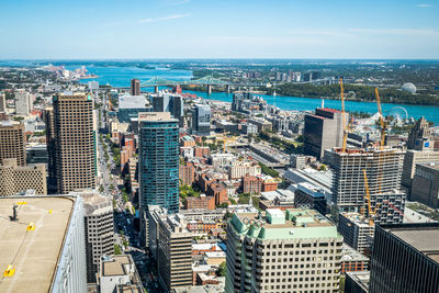 High angle view of buildings in city against sky