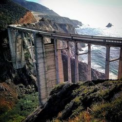 View of dam on bridge against sky