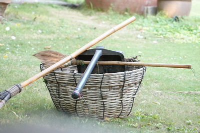 High angle view of wicker basket on field