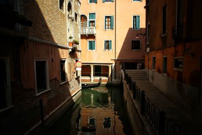 Canal amidst residential buildings