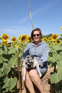 Portrait of smiling woman with dog