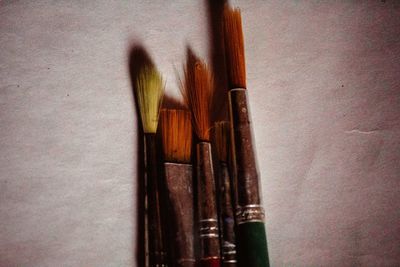 Close-up of paintbrushes on table