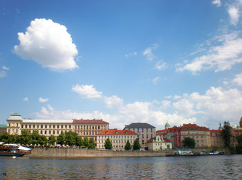 View of buildings in city against sky