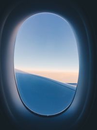 View of sea seen through airplane window