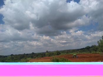 Scenic view of field against sky