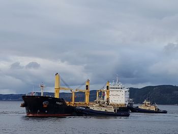 Nautical vessel on sea against sky