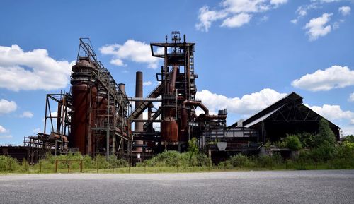 View of factory against sky