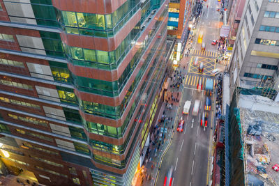 High angle view of street amidst buildings in city