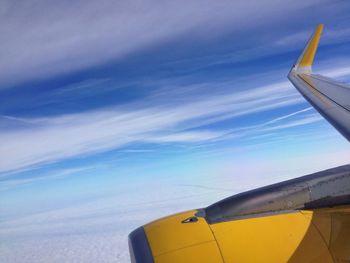 Cropped image of airplane against sky