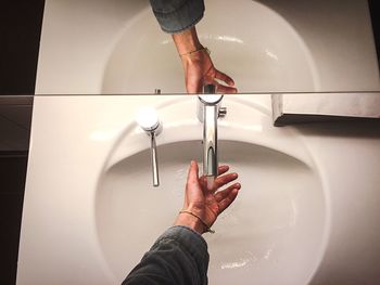 Cropped image of woman holding hands