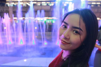 Portrait of smiling young woman