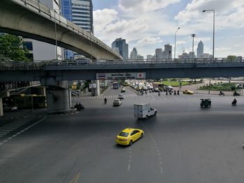 View of bridge in city against sky