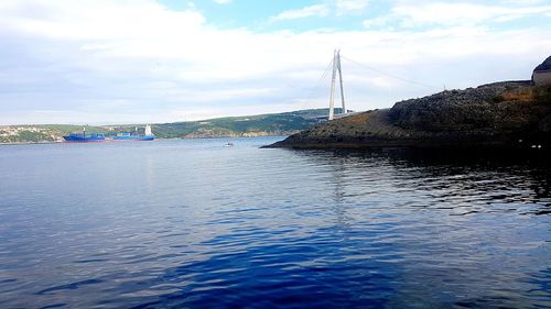 Sailboats moored in marina