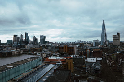 High angle view of buildings in city against sky