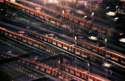 High angle view of train on railroad tracks in city