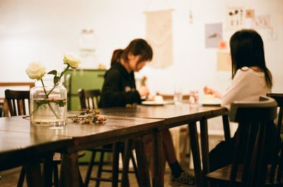 Young women sitting in restaurant