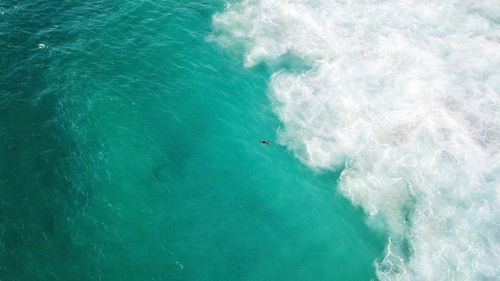 High angle view of waves in sea