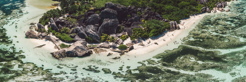 High angle view of rocks by sea