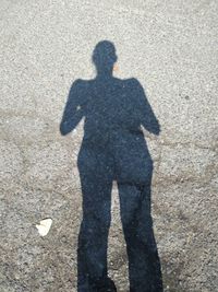 Shadow of man standing on floor