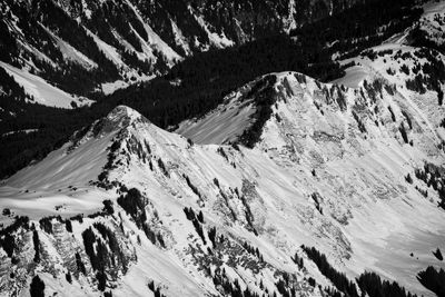 Scenic view of snow covered mountains