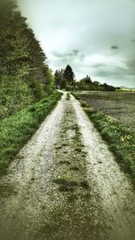 View of road against cloudy sky