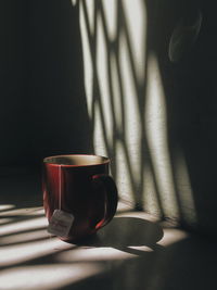 Close-up of coffee cup on table