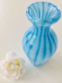 Close-up of white flower vase on table