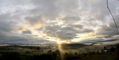 Scenic view of landscape against sky during sunset