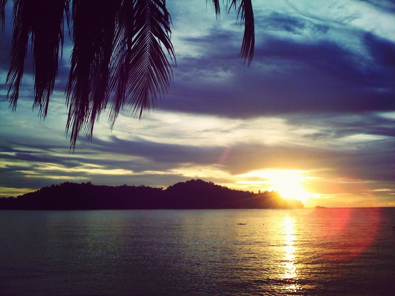 sunset, sky, water, tranquil scene, cloud - sky, tranquility, scenics, silhouette, reflection, beauty in nature, waterfront, cloud, sea, sun, nature, idyllic, cloudy, orange color, lake, dramatic sky