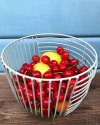 High angle view of fruits in basket on table