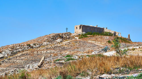 View of fort against blue sky