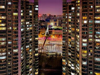 Modern buildings in city at night