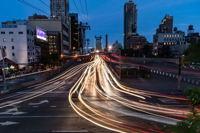 High angle view of light trails on city street