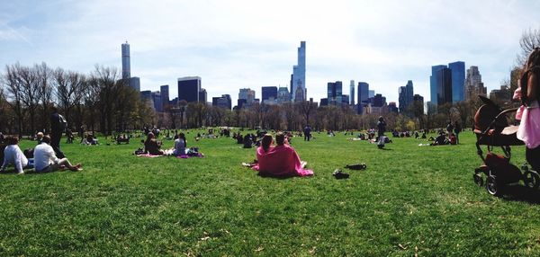 Group of people relaxing in park