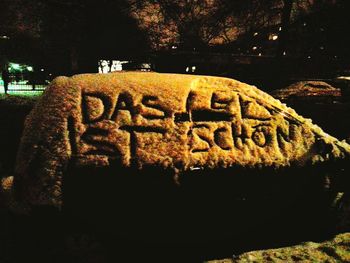 Close-up of text on wall