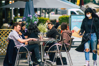 People sitting on table at restaurant