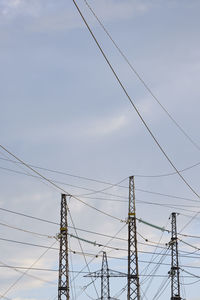 Low angle view of electricity pylon