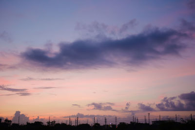 Low angle view of dramatic sky during sunset