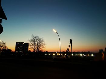 Silhouette of city at night