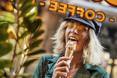 Young woman eating food