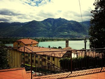 Scenic view of lake with mountains in background
