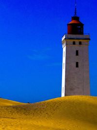 Low angle view of lighthouse against sky