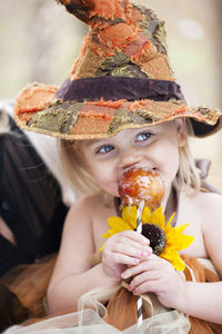 Girl wearing witch hat